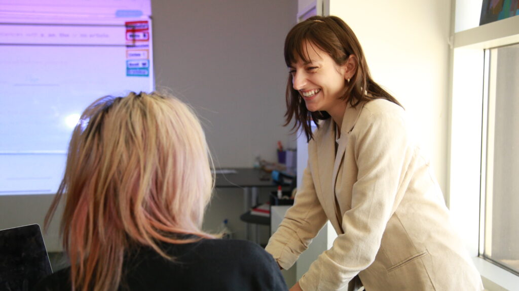 Ms. Rebecca Pompili helping studnet