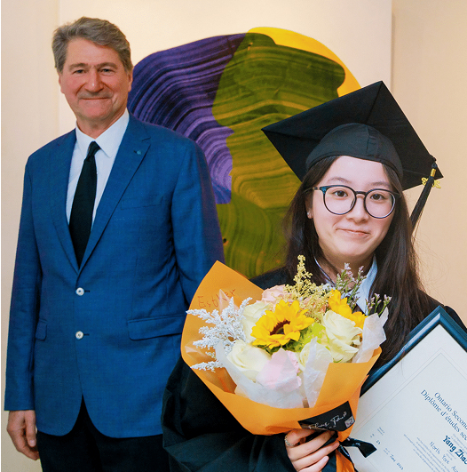 student graduating with principal